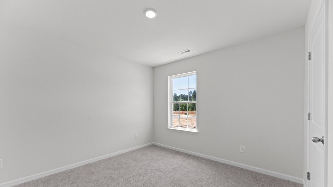 Spacious, unfurnished interior of a new home in Beaver Dam Crossing, Bailey (Image 25). Spacious, unfurnished interior of a new home in Beaver Dam Crossing, Bailey (Image 25).