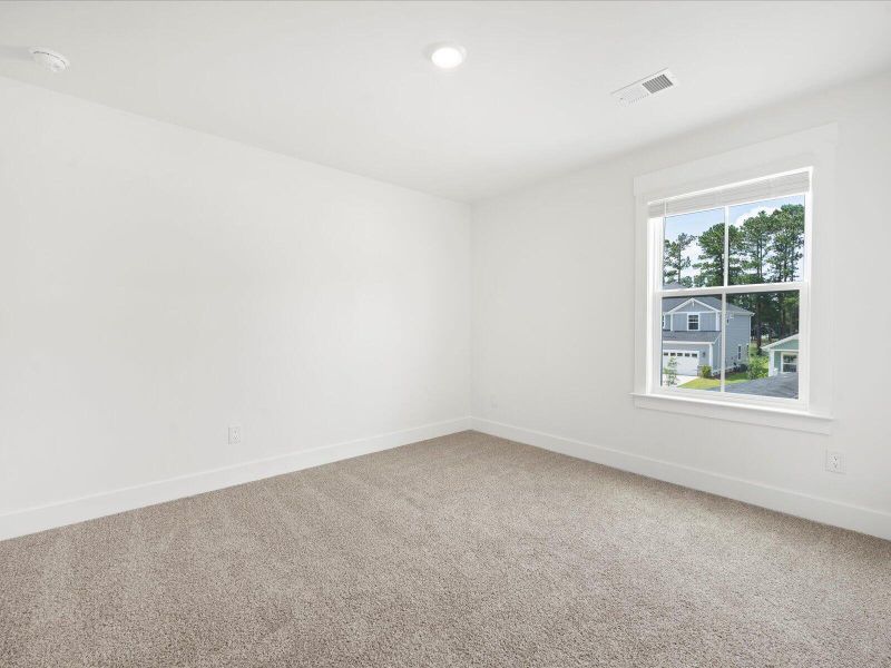 Spacious, unfurnished interior of a new home in The Coves at Lakes of Cane Bay, Summerville (Image 22). Spacious, unfurnished interior of a new home in The Coves at Lakes of Cane Bay, Summerville (Image 22).