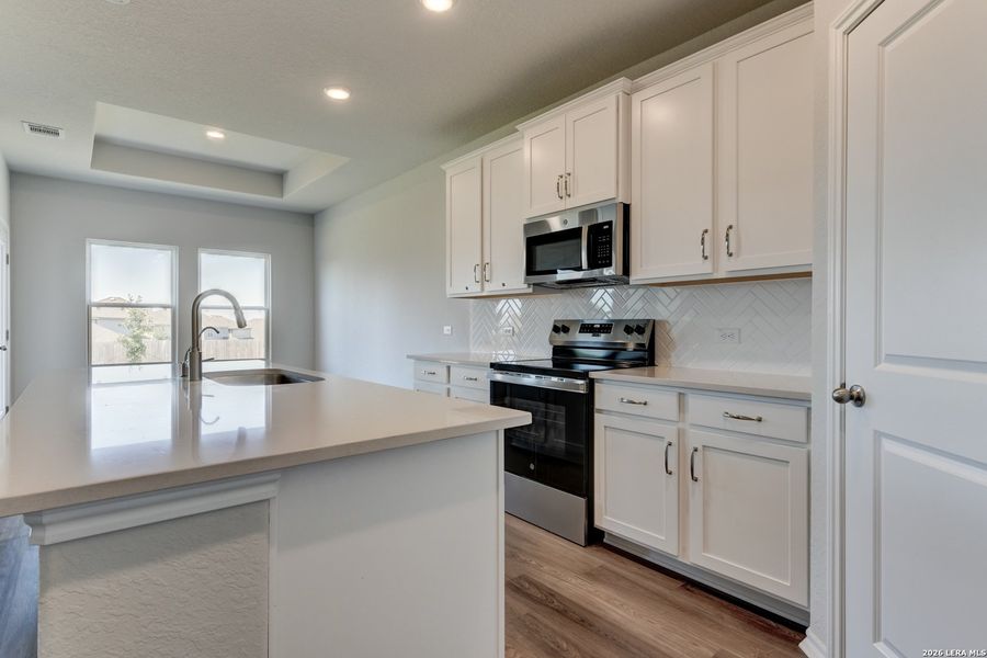 Furnished interior view inside a new home in Hennersby Hollow, San Antonio (Image 4).