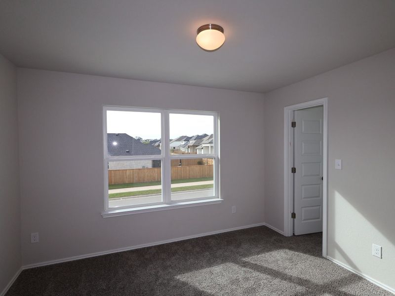 Spacious, unfurnished interior of a new home in Heritage, Dripping Springs (Image 8).