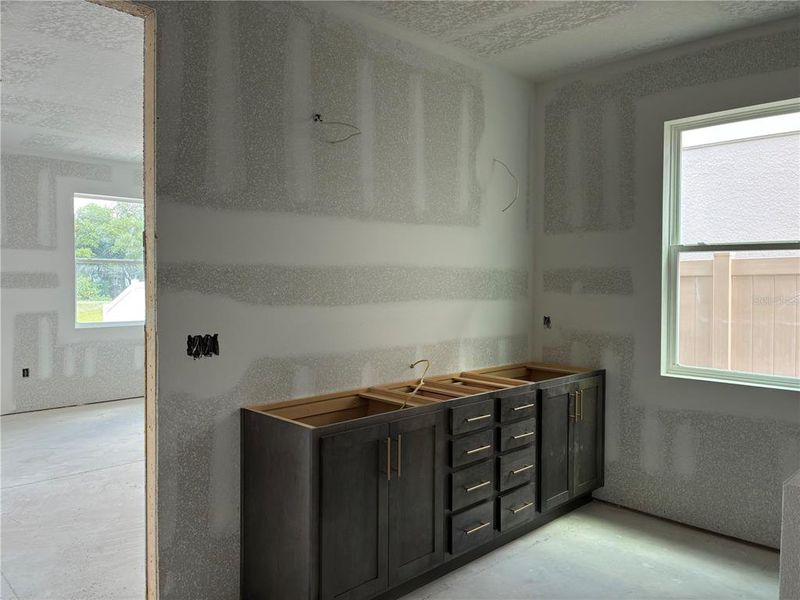 In-progress construction of a new home in Oakfield Trails, Parrish, FL (Image 23).