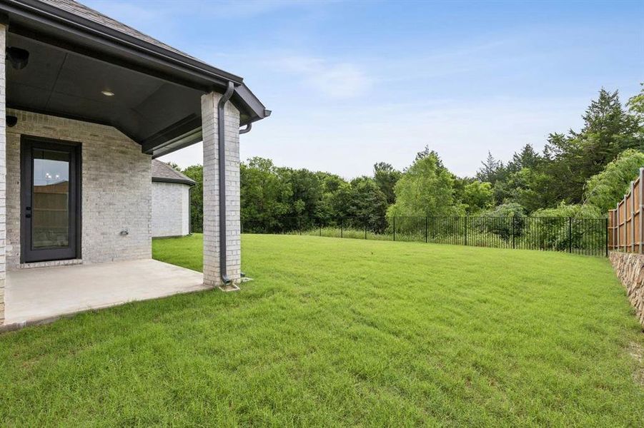 Exterior details and patio area of a home in Westside Preserve, Midlothian (Image 3). Exterior details and patio area of a home in Westside Preserve, Midlothian (Image 3).