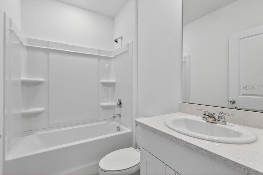 Furnished interior view inside a new home in Waterstone, Groveland (Image 14). Furnished interior view inside a new home in Waterstone, Groveland (Image 14).