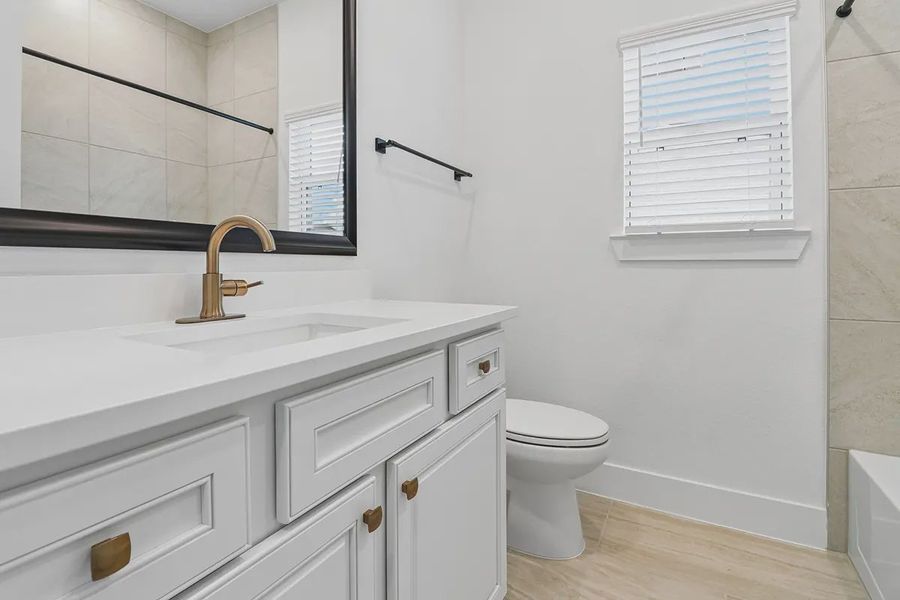 Furnished interior view inside a new home in Parkside on the River, Georgetown (Image 13).