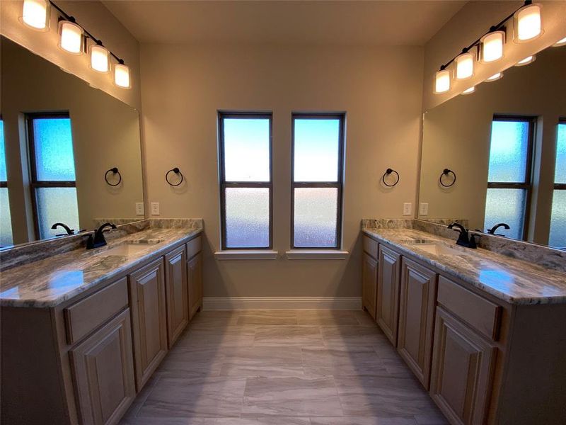 Master bath offers his & hers vanities Master bath offers his & hers vanities