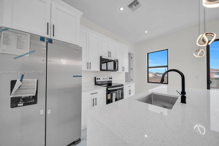 Furnished interior view inside a new home in , Lehigh Acres (Image 7).