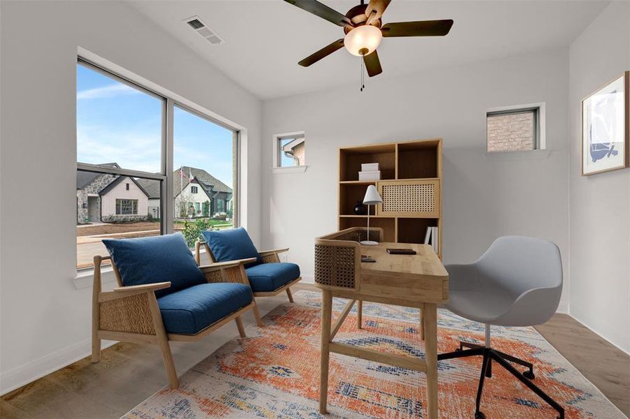 Office area with ceiling fan and wood finished floors