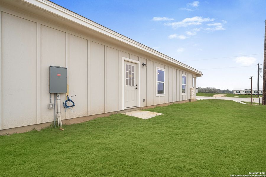 Exterior details and patio area of a home in , La Vernia (Image 25).
