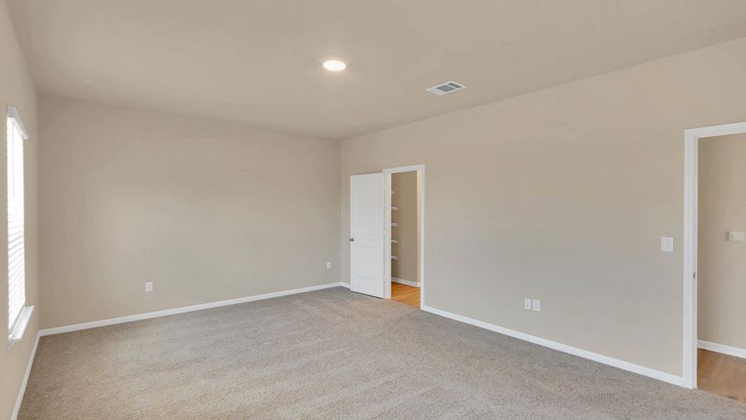 Spacious, unfurnished interior of a new home in Bar W Ranch, Leander (Image 19).