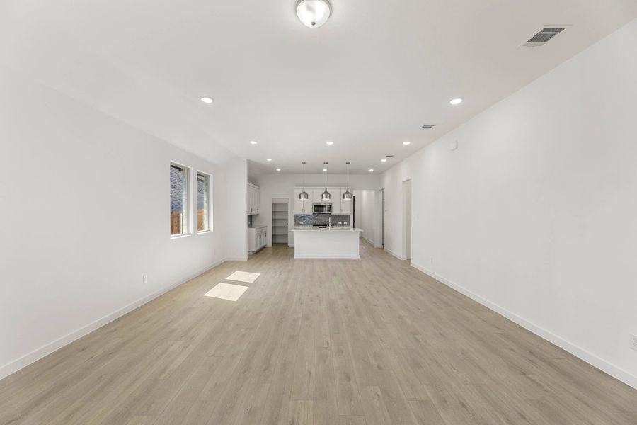 Open Kitchen-Living-Dining Room featuring the Coastal Collection