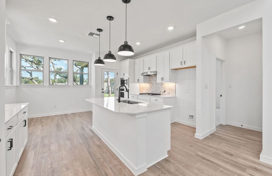 Furnished interior view inside a new home in Wolf Ranch, Georgetown (Image 7).