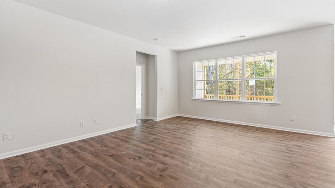 Representative unfurnished interior of a home built from the Booth by D.R. Horton in River Stone, Elm City (Image 9).