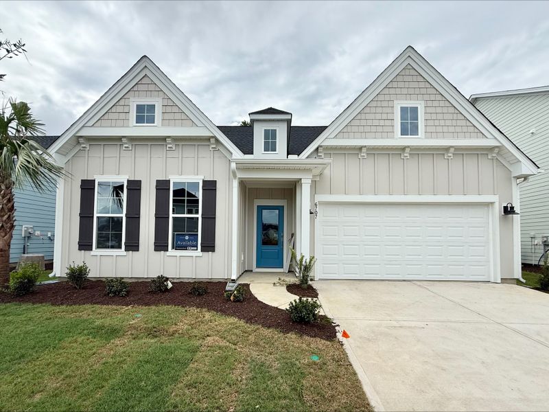 Front exterior of a new home in Grand Park, Leland, NC, highlighting curb appeal (Image 1). Front exterior of a new home in Grand Park, Leland, NC, highlighting curb appeal (Image 1).