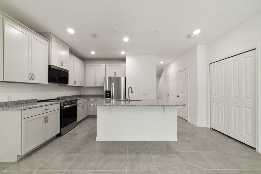 Furnished interior view inside a new home in Towns at Greenleaf, Oviedo (Image 13).