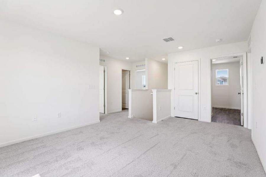 A room with white doors.