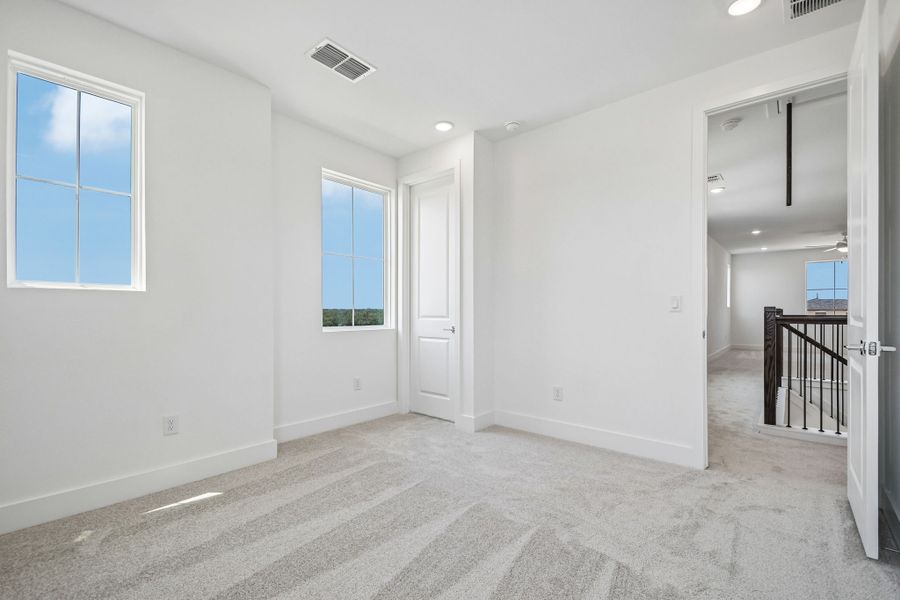 Spacious, unfurnished interior of a new home in Freedom at Anthem, Kyle (Image 21).