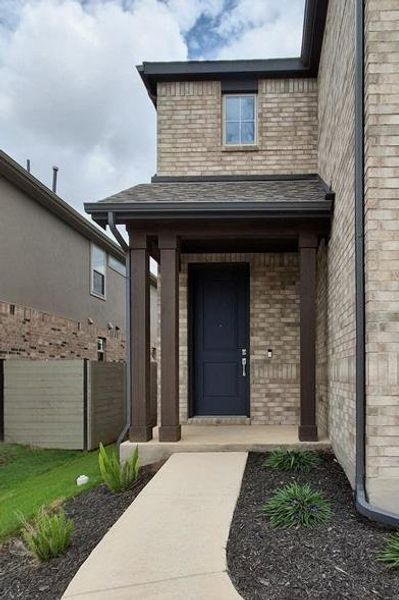 Exterior details and patio area of a home in Wolf Ranch, Georgetown (Image 3).