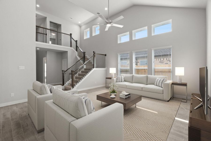 *Virtually Staged* Take another glimpse into the heart of the home with this additional view of the family room—a sprawling space ready to accommodate all your gatherings. Sample photo of completed home with similar floor plan. Actual colors and selections may vary. *Virtually Staged* Take another glimpse into the heart of the home with this additional view of the family room—a sprawling space ready to accommodate all your gatherings. Sample photo of completed home with similar floor plan. Actual colors and selections may vary.