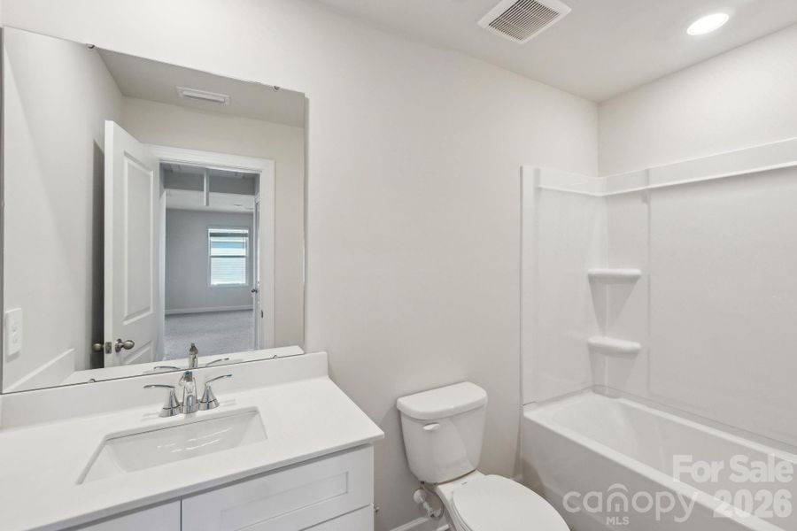 Photo is not of the actual home, but is an inspirational photo of builder’s model home and may depict options, furnishings, and/or decorator features that are not included