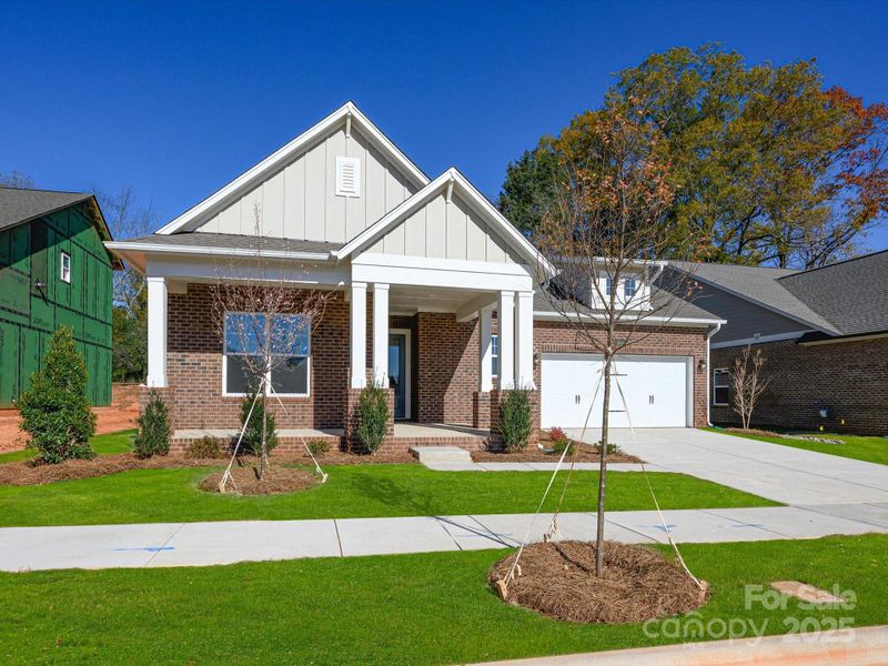 Front exterior of a new home in Whitley Preserve – Enclave Collection, Mint Hill, NC, highlighting curb appeal (Image 2).