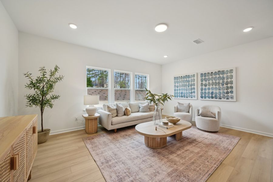 Representative furnished interior of a home built from the Leland by Ashton Woods in Rowland's Grant, Fuquay Varina (Image 9).