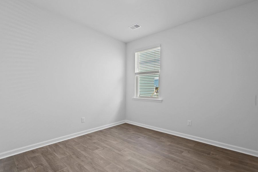Spacious, unfurnished interior of a new home in Pine Hills at Cane Bay, Summerville (Image 18).