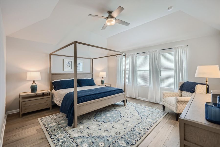 Enter the primary bedroom!  Enough room for a king-sized canopy bed, plus dressers and seating galore.  You can truly relax in comfort and luxury in this large, open and bright owner's retreat!