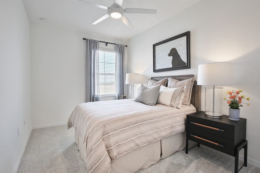 Representative furnished interior of a home built from the Morgan by Neal Communities in SkySail, Naples (Image 7).