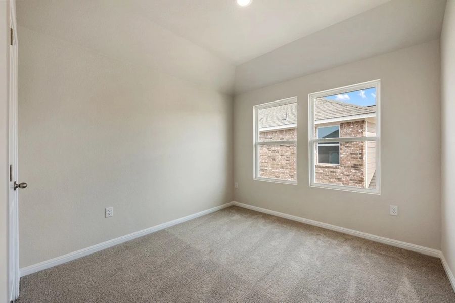 Spacious, unfurnished interior of a new home in The Colony, Bastrop (Image 39).