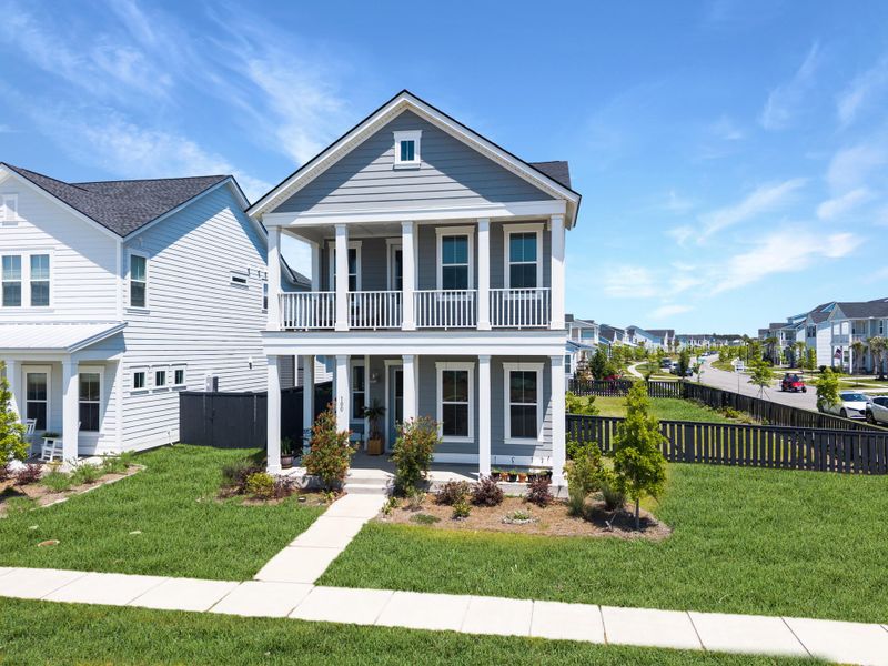 Front exterior of a new home in Carnes Crossroads, Summerville, SC, highlighting curb appeal (Image 25). Front exterior of a new home in Carnes Crossroads, Summerville, SC, highlighting curb appeal (Image 25).
