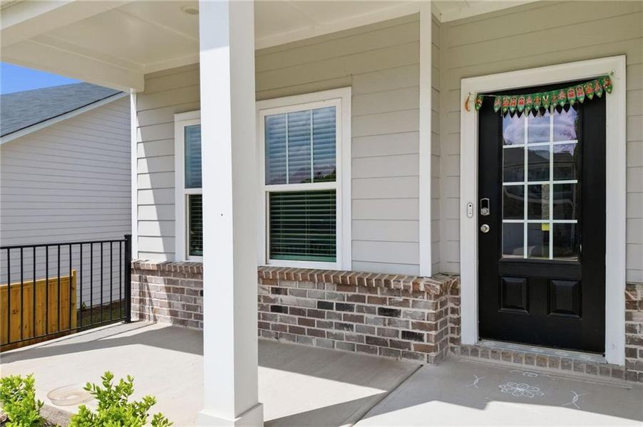Exterior details and patio area of a home in Vistas at Towne Mill, Canton (Image 29).