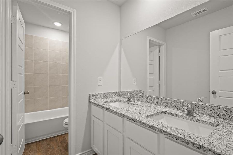 Furnished interior view inside a new home in Retreat at Fossil Creek, Fort Worth (Image 5). Furnished interior view inside a new home in Retreat at Fossil Creek, Fort Worth (Image 5).