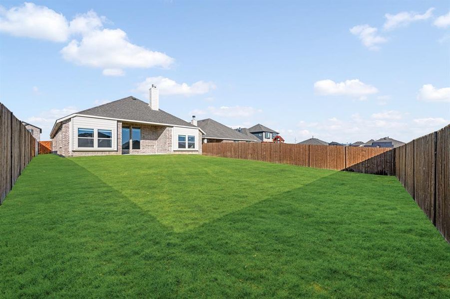 Exterior details and patio area of a home in Godley Ranch Classic, Godley (Image 4).