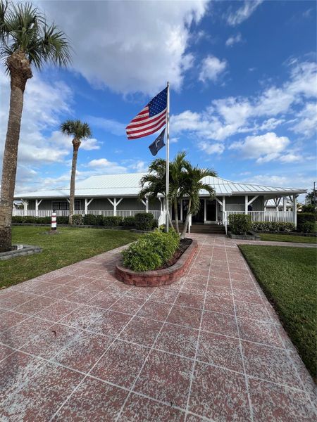 Front exterior of a new home in , Okeechobee, FL, highlighting curb appeal (Image 14).
