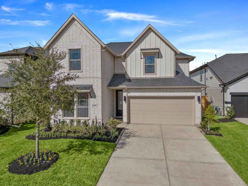 Front exterior of a new home in , Missouri City, TX, highlighting curb appeal (Image 2).