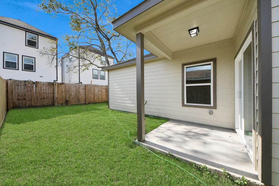 Exterior details and patio area of a home in , Houston (Image 25).