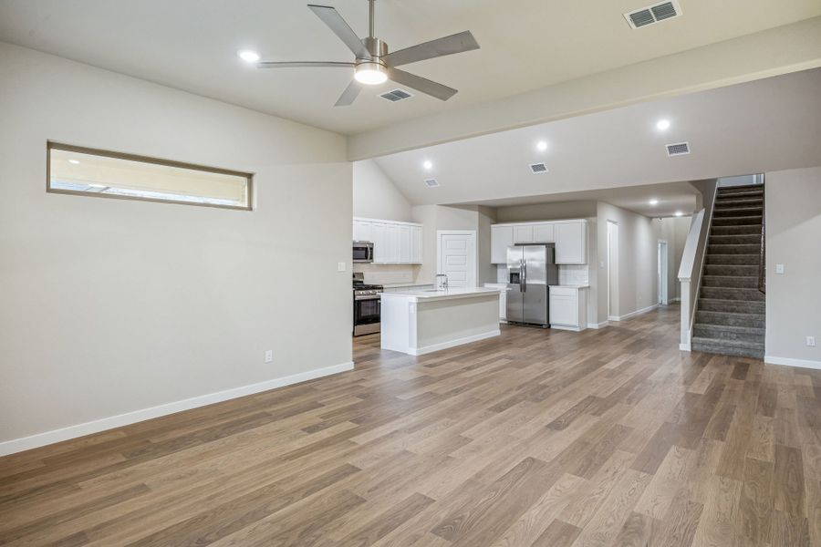 Living Room in the Wimbledon home plan by Trophy Signature Homes – REPRESENTATIVE PHOTO