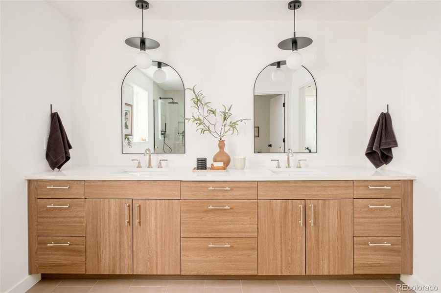 Custom double vanity provides ample storage