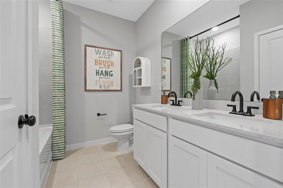 Furnished interior view inside a new home in The Cypress Series at Reserve East, Flagler Beach (Image 27).