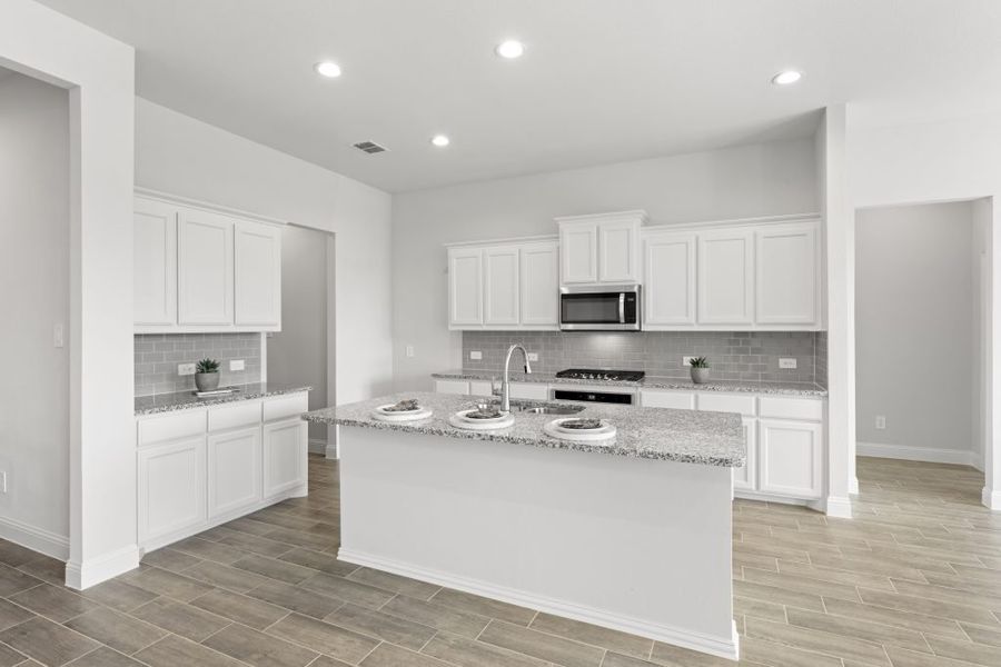 Representative exterior photo of a completed home built from the Hampton by Impression Homes in Timberbrook, Justin, TX (Image 5). Representative exterior photo of a completed home built from the Hampton by Impression Homes in Timberbrook, Justin, TX (Image 5).