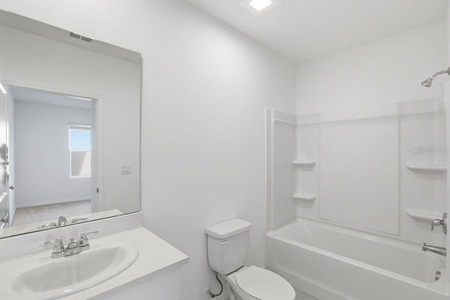 Furnished interior view inside a new home in Waterstone, Groveland (Image 15).