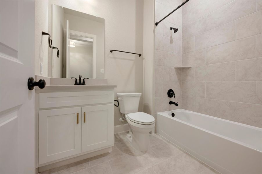 Furnished interior view inside a new home in Harvest Green - Reserve Collection, Richmond (Image 4).