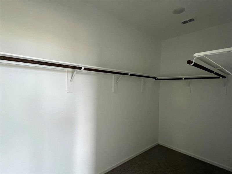 Huge primary walk-in closet