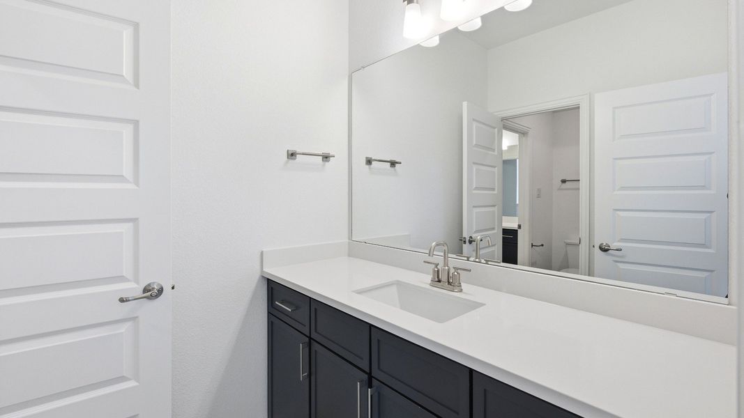 Furnished interior view inside a new home in Oaks at San Gabriel, Georgetown (Image 10).