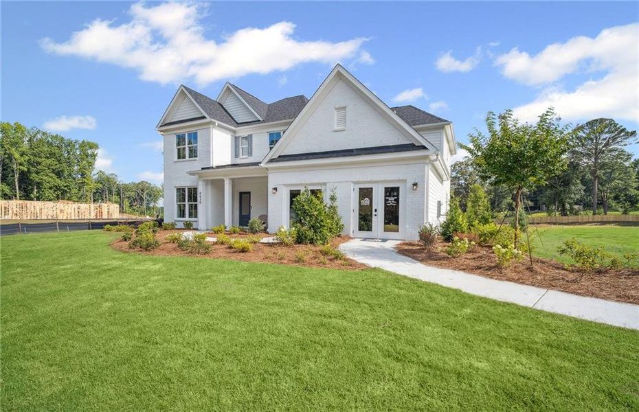 Front exterior of a new home in Rose Creek, Cumming, GA, highlighting curb appeal (Image 23). Front exterior of a new home in Rose Creek, Cumming, GA, highlighting curb appeal (Image 23).