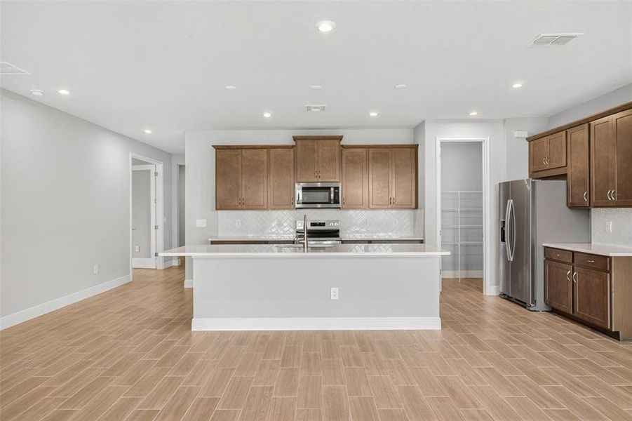 Furnished interior view inside a new home in Windwater, Parrish (Image 5).