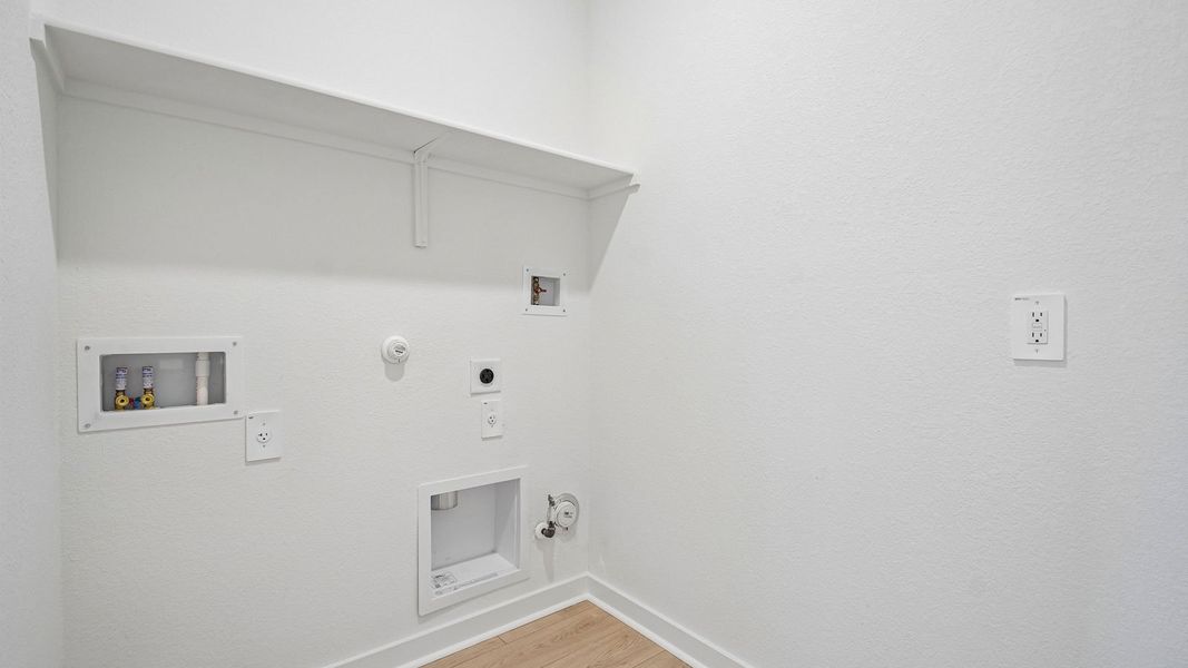 Spacious, unfurnished interior of a new home in Rosenbusch Ranch, Leander (Image 27).