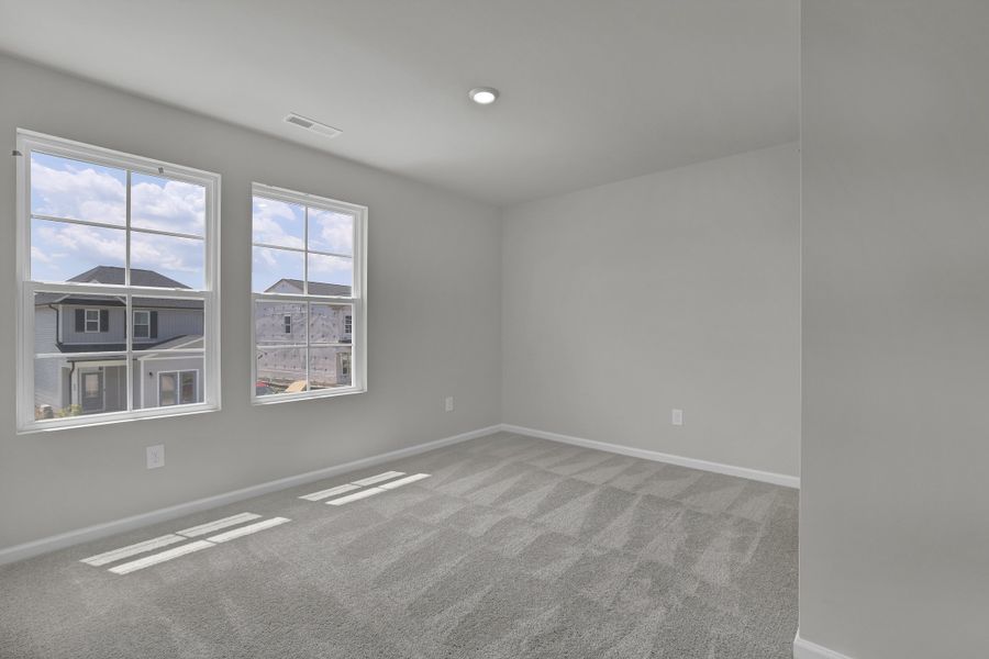 Spacious, unfurnished interior of a new home in River Tide Farms, Bolivia (Image 23).