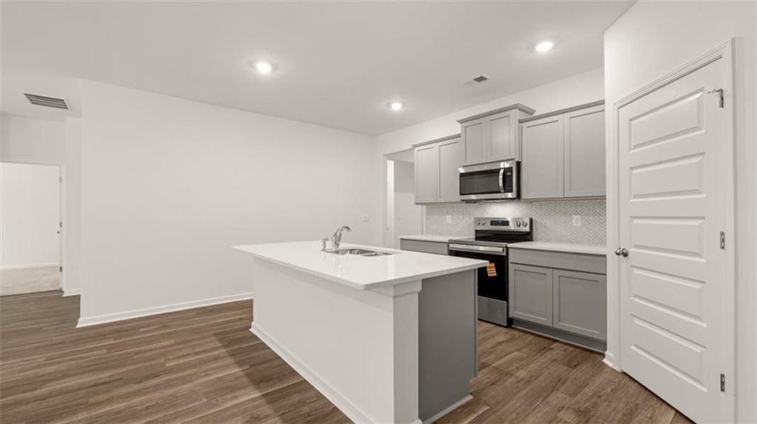 Furnished interior view inside a new home in The Reserve at Calcutta, Stockbridge (Image 6).
