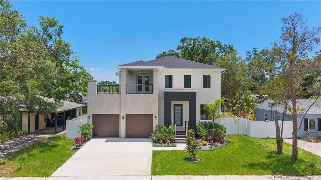 Front exterior of a new home in , Tampa, FL, highlighting curb appeal (Image 1). Front exterior of a new home in , Tampa, FL, highlighting curb appeal (Image 1).